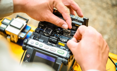 Man working on fiber cable